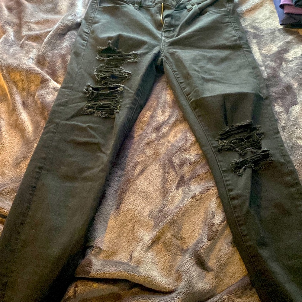 American Eagle distressed jeans with raw hem.